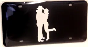 "Cowboy Couple" Mirrored License Plate Dark